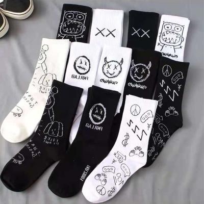 China Autumn Korean black and white cotton sports fashion graffiti 100% happy face socks for girls boy spring for sale