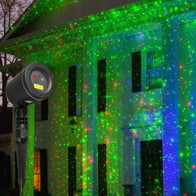 Cina Cheap Light Controlled Light Sensor Mini Projector Christmas Light Outdoor Laser in vendita