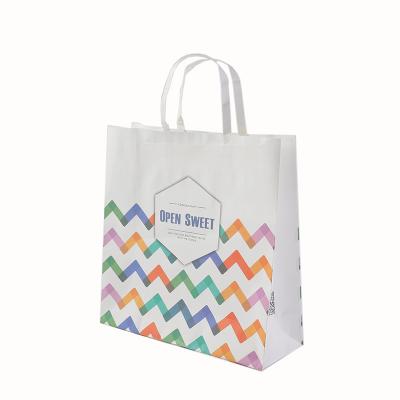 China Recyclable Christmas Printing Custom Paper Bag For Cosmetic Kraft Paper Bag With Handle for sale