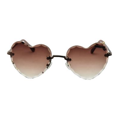 China Fashion sunglasses 2021 hot sale heart shape cheap sunglasses women rimless sunglasses for sale