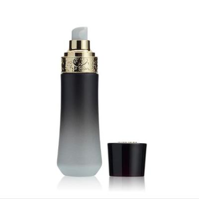 China New Personal Care Basic Bottles With Pumps , Custom Gold And Black Frosted Glass Cosmetic Bottle Packaging for sale