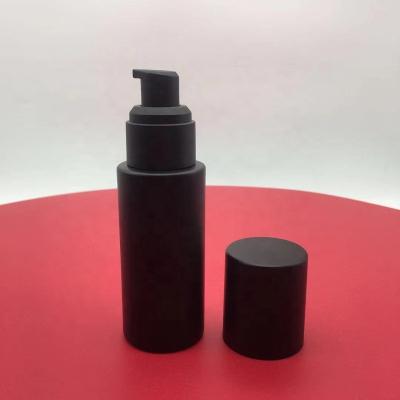 China Personal Care 50ml Matte Black Liquid Foundation Airless Bottle With Matte Black Pump Cap for sale