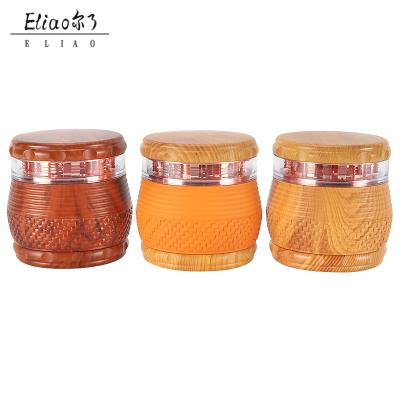 China New Erliao Traditional Style 4 Parts Herb Grinder Super Level 70mm Grinder Wholesale Tobacco Manufacturer Plastic Resin for sale