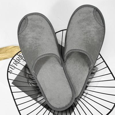 China Exquisite Disposable Hotel Amenities Non Slip Hotel Slippers Sole Manufacturer Low Price Eva For Women And Men Soft White OEM Customized Logo Fabric Color Featur for sale