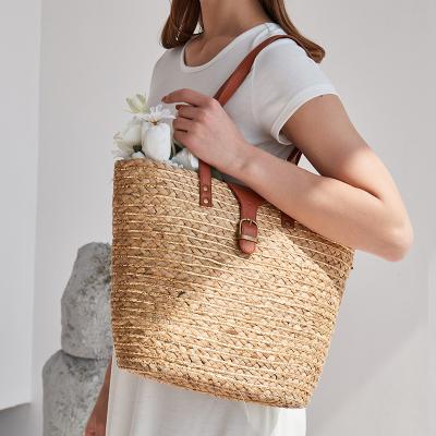 China Fashion Factory Direct Sales Straw Tote Brown Snap Women Summer Bohemian Handbag Bali Beach Handwoven Bag Ladies Summer Shoulder Bags for sale