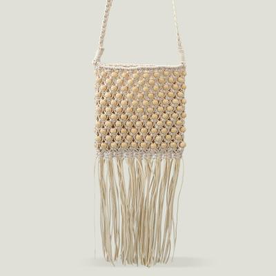 China Fashion Hollow Beading Women's Handbags Long Tassel - Cross Woven - Body Bag Summer Beach Shoulder Bag Bali Handmade Small Purse 2022 for sale