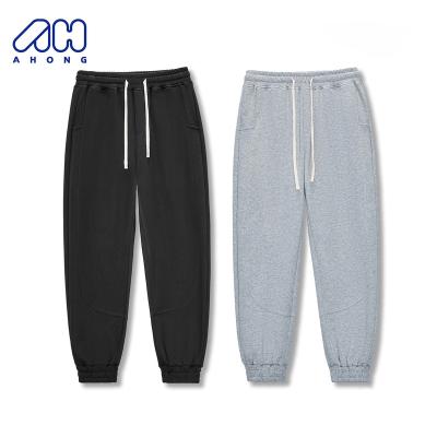 China Hot Selling Breathable Articulated Solid Color Casual Straight Leg Pants Skin Friendly Breathable Sports Fitness Running Sweatpants for sale