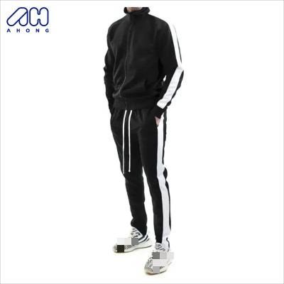 China Custom Breathable Logo Men's Jogging Suits Wholesale Simple Breathable Contrast Panel Solid Color Gym Fitness Sets Tracksuit for sale