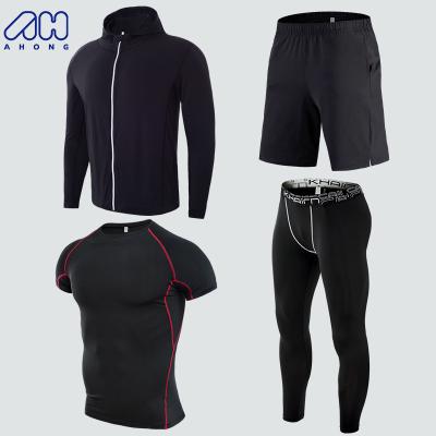 China New Coming Breathable Men Gym Muscle Sports Suits 4 Pcs Sets Quick-Drying Running Sports Jacket And Pants Mens Fitness Clothes Suits for sale