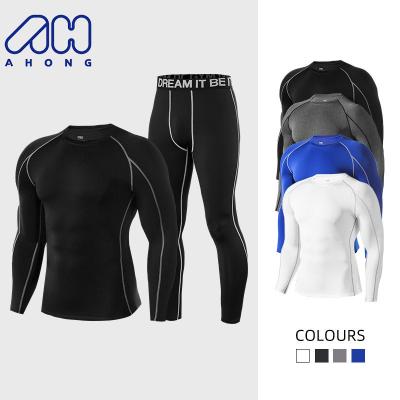 China 2023 Hot Selling Custom Logo Men Breathable Sports Suits Running Gym Fitness Sweatsuits Two Piece Set Tight Men Sports Suits for sale