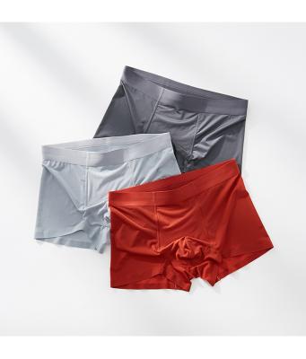 China Antibacterial Men Ice Red Munafie Underwear Silk Brief Comfortable Breathable And Seamless Boxer for sale