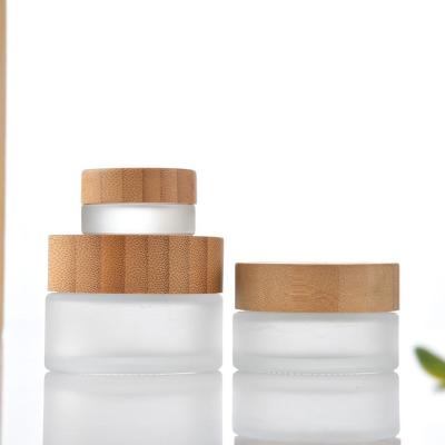 China Personal Care Factory Sale Essential Oil Perfume 10ml Clear Transparent Round Shape Roll On Roll Glass Bottle With Bamboo Lid Payment Terms for sale