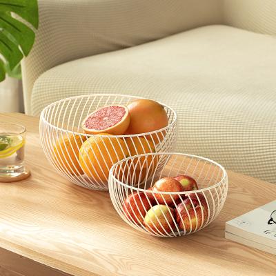 China Countertop Creative Iron Fruit Basket Geometry Wire Mesh Metal Bowl Kitchen Storage Vegetable Fruit Basket for sale