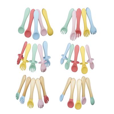 China Baby Feeding Spoon Custom Washable Wooden Silicone Baby Feeding Spoon Organic Soft Tip Spoon BPA Free Food Grade Toddlers Handle Materials for sale