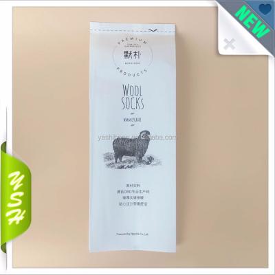 China Custom Made Moisture Proof Kraft Paper Packaging White Side Seal Gusset Clothing Plastic Bag for sale