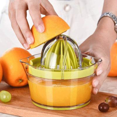 China Success Kitchen Products Lemon Manual Eco-Friendly Accessories Online Fruit Juicer Orange Squeezer With Measuring Cup And Grater for sale