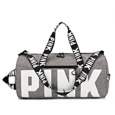 China Durable Travel Tote Bag Customized Logo Gym Women Pink Large Capacity Duffel Bags Waterproof Sports Travel Bag for sale