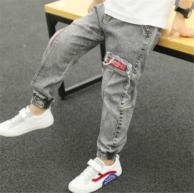 China 2021 new fashion boy child loose cotton pants cotton jeans 4-9T sustainable printed patched casual kids jeans for sale