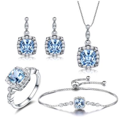 China Romantic Drop Shipping Custom Made 925 Sterling Silver Set Sky Blue Topaz Necklace Earrings Ring Bracelet Four Piece Set for sale