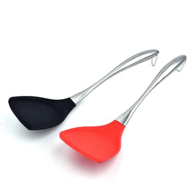 China Stocked High Quality Modern Nonstick Handle Turner For Kitchen Stainless Steel Cooking Tools Silicone Wok Spatul for sale