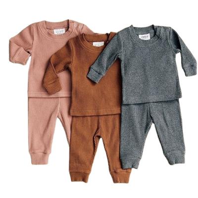 China Factory custom children's clothing infant boys and girls anti-static sleeving long base baby clothes solid color homewear sets for sale