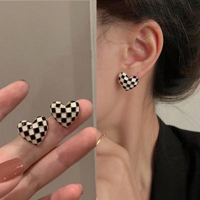 China FASHIONABLE Korean Small Fairy Tale Mori Style Earrings Sweet 925 Silver Needle Oil Checkerboard Love Stud Drip Earrings for sale