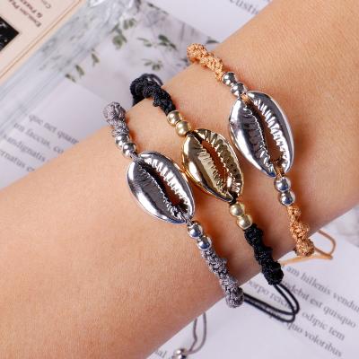 China Bohemian Gold and Silver Cowrie Shell Charm CLASSIC Handmade Wavy Colorful Rope Bangle Knot Style Bracelet for sale