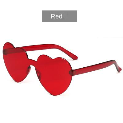 China Fashion sunglasses wholesale new European and American style fashion personalized integrated glass candy color heart-shaped sunglasses for sale