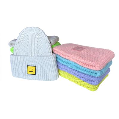 China Autumn Warm Thicken Cashmere Smiling COMMON Face Beanie Hats Cute Hemming Knitted Winter Wool Cap For Women for sale