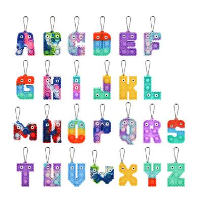 China Adults Chill Toys Cartoons Push Bubble Key Chain 26 Letters Simple Mini Alphabet Fidget Keychain Pendant Jumpy Person for sale