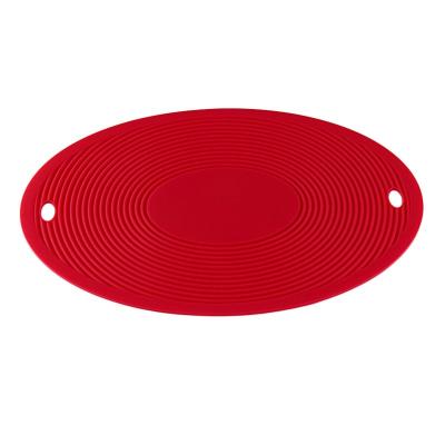 China Sustainable Factory Direct Sales 2022 Low Ellipse Soft Silicone Kitchen Coasters Ambient Drink Coasters for sale