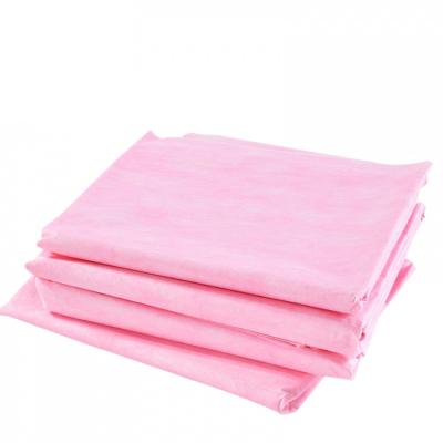 China Soft disposable bed sheet withe rope bed sheet roll disposable non-woven sheets set for sale