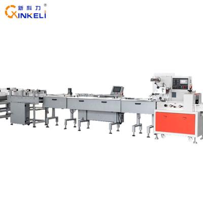 China Food Flow Packaging Machine for Bread Biscuit Biscuits Automatic Loading into Tray Machine for sale