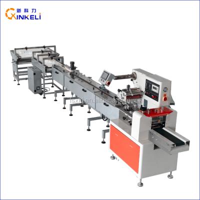 China Automatic horizontal automatic feeding products packaging machine for granola bar for sale