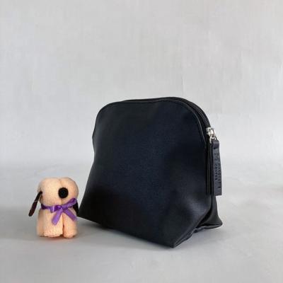 China OEM Waterproof Cosmetic Cute Toiletry Bag Fashion PU Ladies Cosmetic Bag Hanging White Eyelash Matte Black Cosmetic Bags for sale