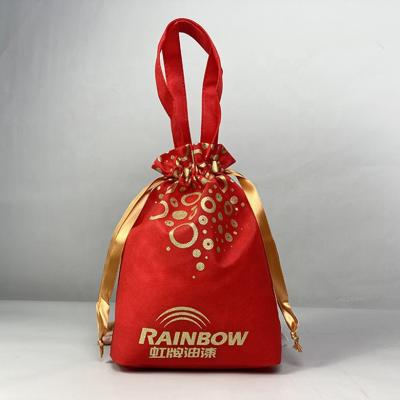 China Reusable Red Non Woven Rope Gift Bag Sublimation Non Woven Bags or New Year Handle Customized Material Non Woven Bag Fabric Shopping for sale