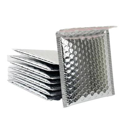 China Metallic Silver 25x30 Waterproof And Tearproof Poly Bubble Mailer Mailer Bags For Shipping for sale