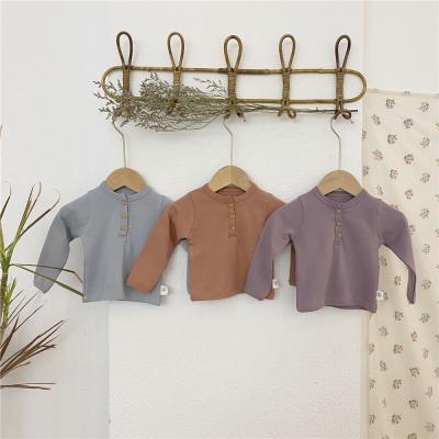 China Breathable Wholesale Cotton T-shirt Solid Korean Baby Tops With 3 Buttons for sale