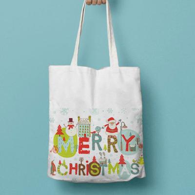 China 2021 New High Quality Christmas Santa Claus Hand Canvas Candy Storage Bags Apple Christmas Canvas Tote Bag for sale