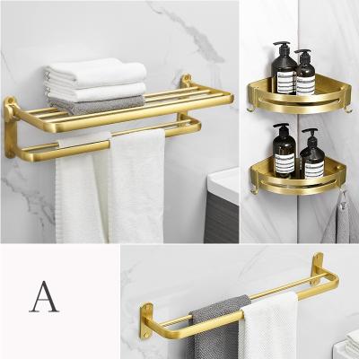 China Wall Mounted Type Towel Rack Aluminum Sanitary Bathroom Gold Double Pole Hanging Rod Rack Drying Bath Towel Storage for sale