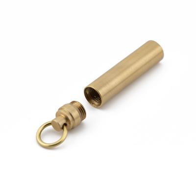 China Mini Portable Outdoor First Aid Mini Waterproof Small Pill Box Brass Key Chain Seals Hanging Small Bottle for sale