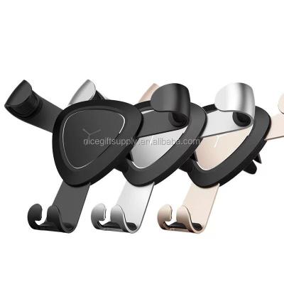 China Aviation Aluminum+Silicone+ABS Gravity Iron Claw Car Bracket Mobile Phone Holder for sale