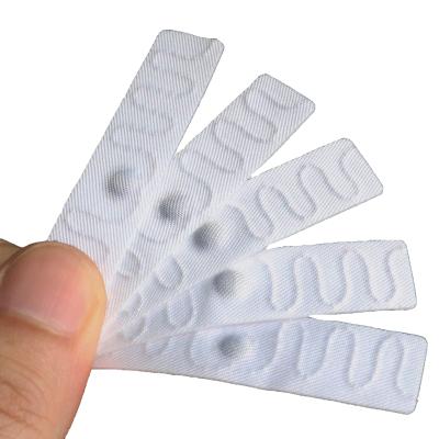 China Long Range Waterproof/Waterproof Textile UHF RFID Washable Laundry Tag For Garment And Clothing Management for sale