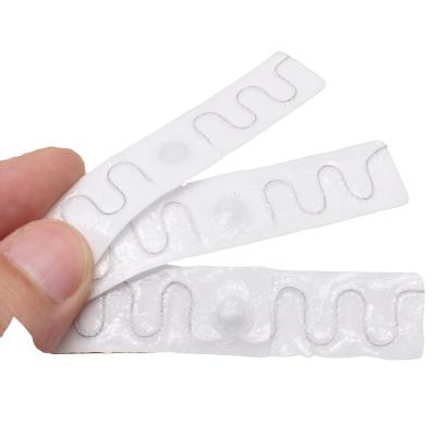 China UHF Waterproof/Waterproof Soft Waterproof Washable Textile Tag Rfid Laundry Tag With High Temperature Resistance for sale