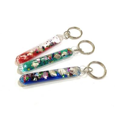 China Promotional Gift Souvenir Magic Glitter Magic Wand With Seashells Promotional Key Chain for sale