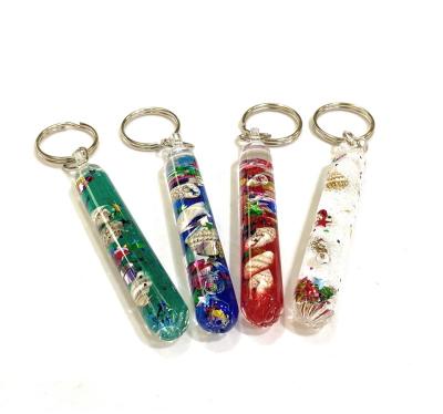 China Gift Motion Liquid Promotional Gift Key Chain Magic Wand With Colorful Shells And Confetti for sale