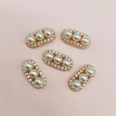 China Viable Arch Form Round Crystal Rhinestone Buttons For Wedding Embellishment Pearl Button Decoration for sale