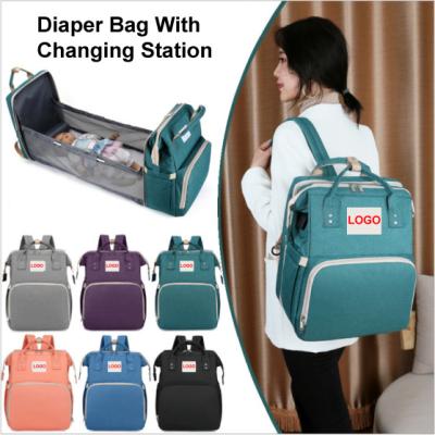 China Waterproof Foldable Diaper Bag Mummy Backpacks Large Capacity Diaper Bag With Changing Station Baby Sleeping Bags 2022 for sale