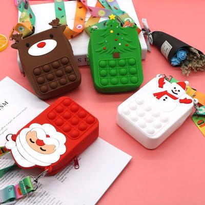 China Waterproof Christmas Gifts Kids Small Coins Bag New Designs Girls Silicone Bags Purse Kid Busy Person Toys For Christmas for sale