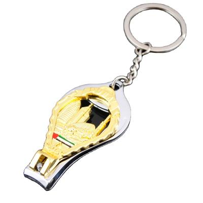 China Finger Dubai Tower Souvenir Bottle Opener Function Gold Silver Nail Clipper Key Chain for sale